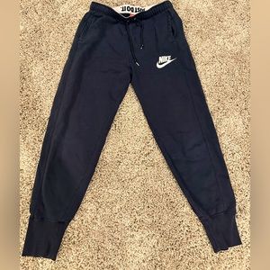 Men’s medium Nike black sweat pants.